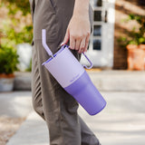 Woman carrying Klean Tumbler with Straw Lid